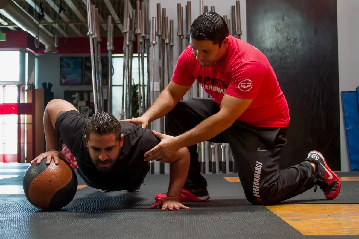 Dr. Chris Garcia coaching a client